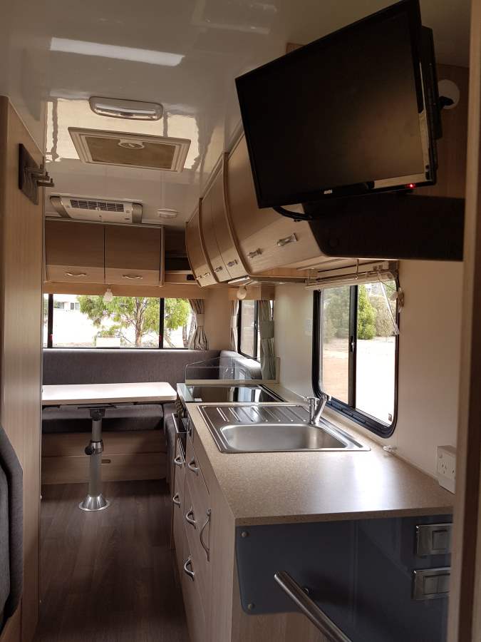 Cruisin Deluxe Kitchen Interior - Campervan Hire Sydney - Campervan Rental Shop