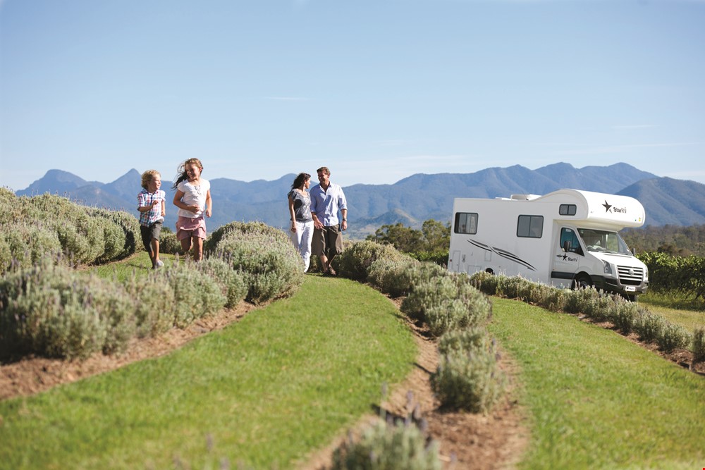 Family Outside Star RV Pandora - RV Rental Canberra - Campervan Rental Shop